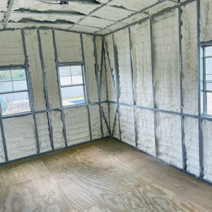 Closed-cell spray foam insulation applied to wall cavities in a residential project in West Samoset