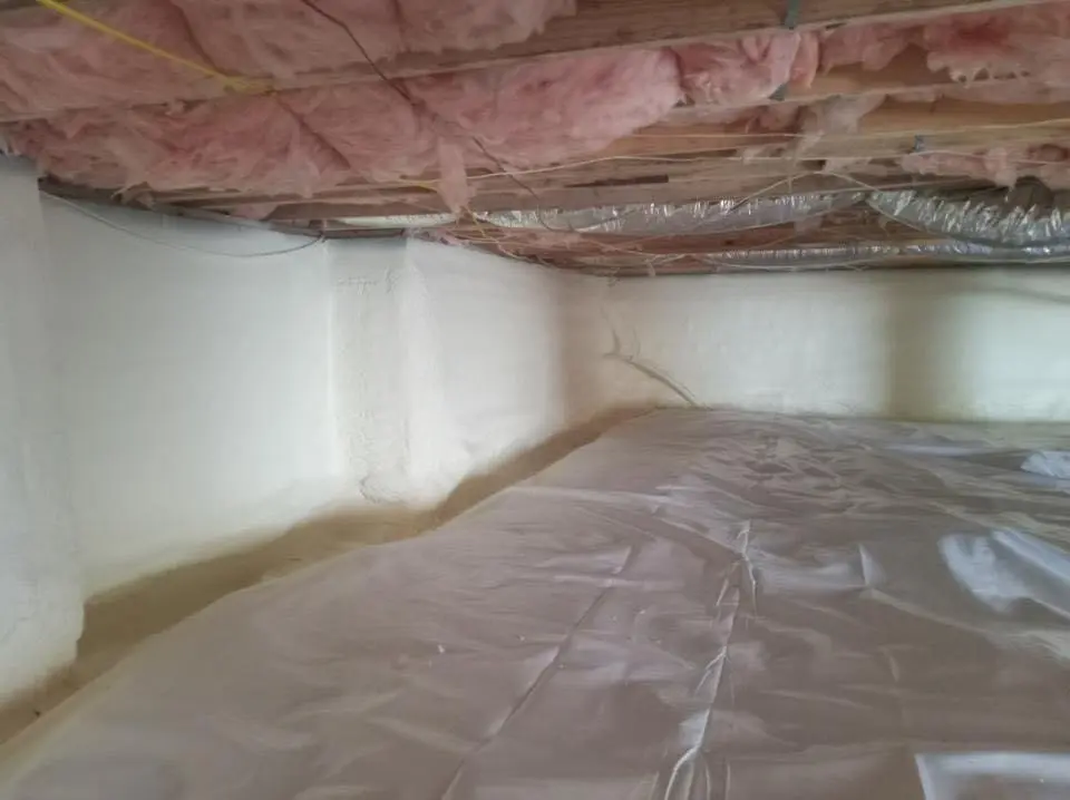 Crawl space encapsulation with closed-cell spray foam for Commercial Roof Restoration in West Samoset